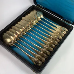Set of 12 Henin & Cie (Co) French Sterling Silver and 18k Gold Vermeil Spoons in Box, c.1900